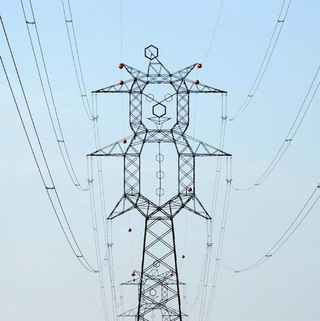 Illustration for article titled These Beautiful Giant Sculptures Support Power Lines With Style